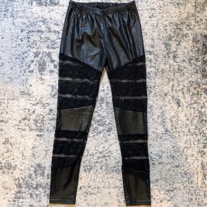 Black Leggings with floral lace blocks.